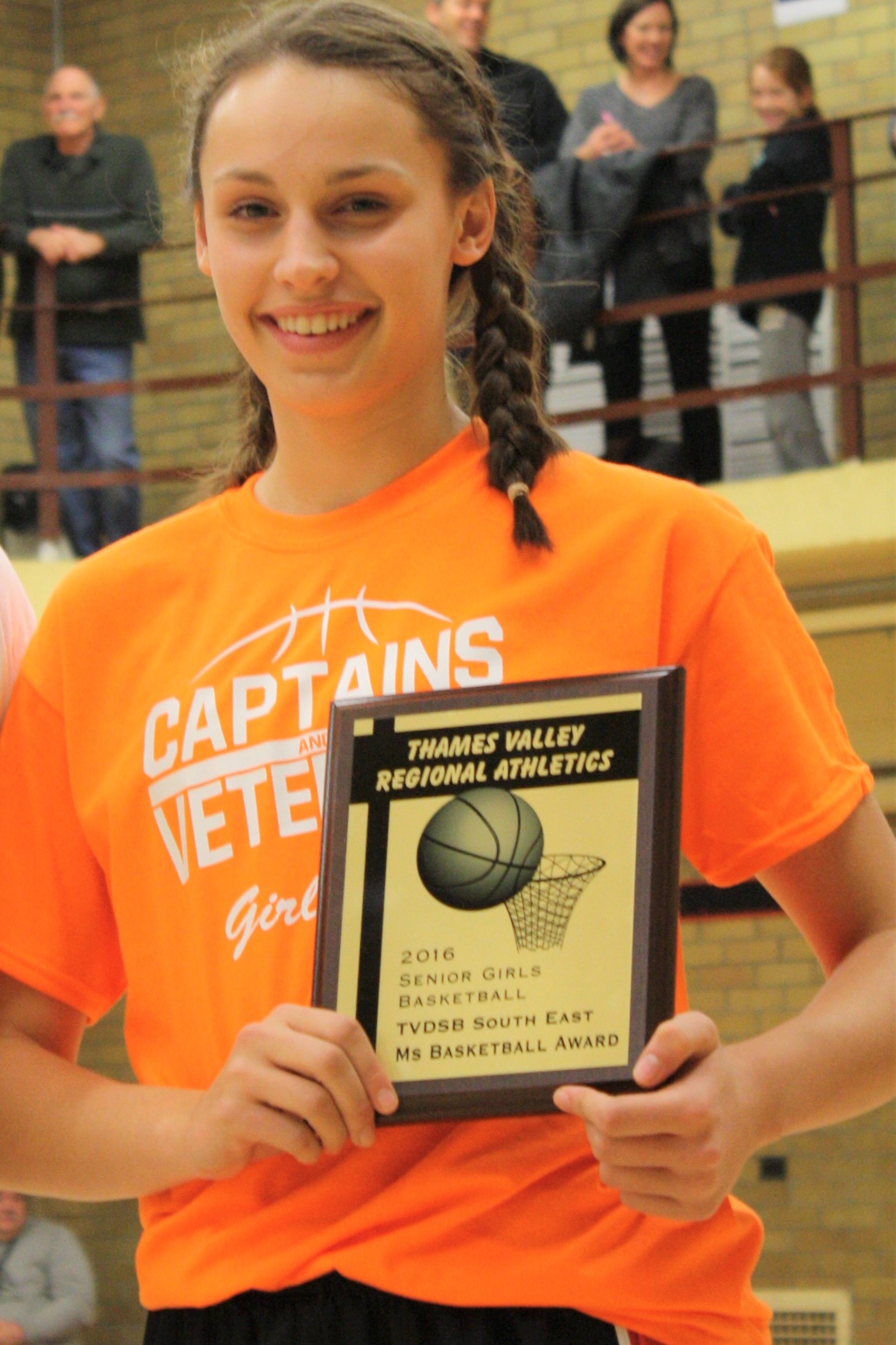 Katie Beaudry with plaque